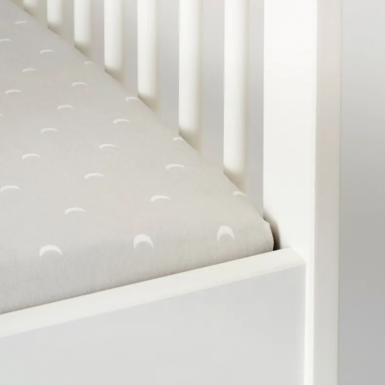 IKEA LENAST ЛЕНАСТ, простирадло на резинці д/дитяч ліжк, в цятку/Місяць, 60x120 см 504.576.00 фото №3
