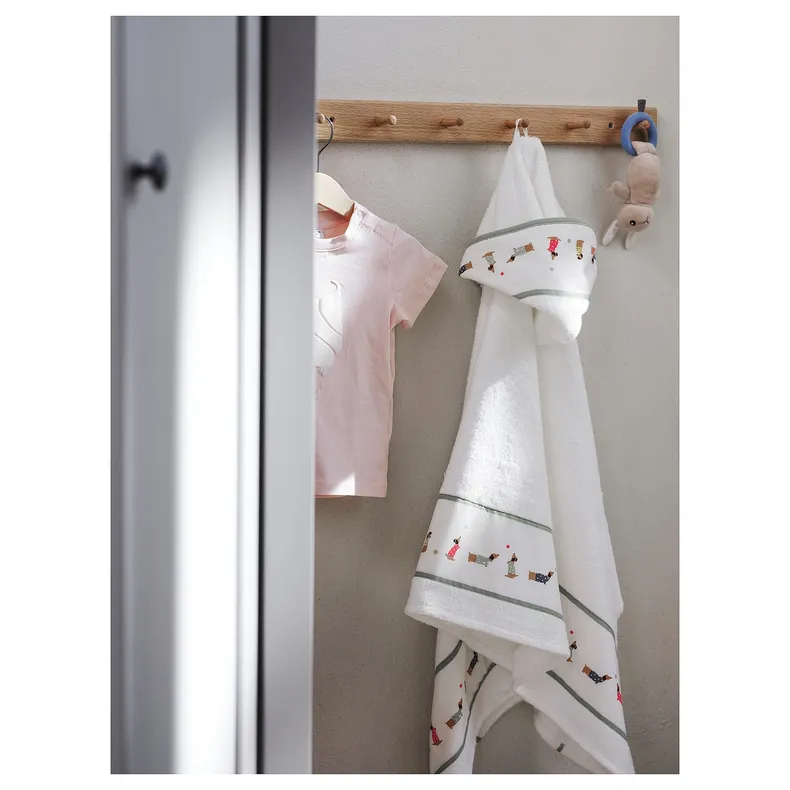 IKEA DRÖMSLOTT ДРЕМСЛОТТ, дитячий рушник із капюшоном, орнамент цуценята/білий, 60x125 см 905.263.76 фото №6